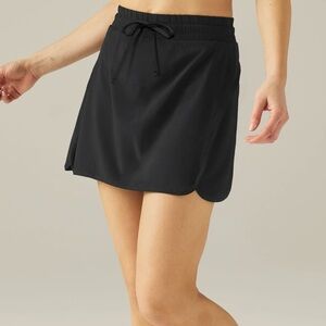 NWT Beyond Yoga In Stride Lined Skirt Stretch Woven XS Black Built-In Shorts $88